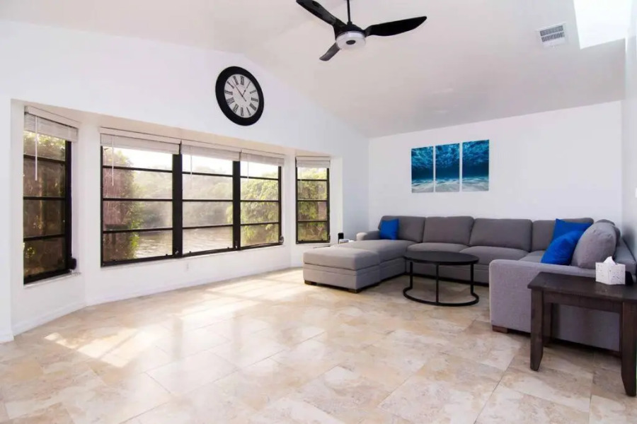 Waterfront House with a Boat and Heated Pool