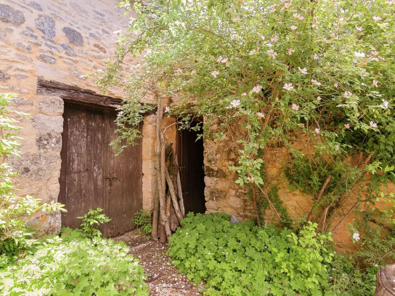 A Romantic Hamlet With Lush Gardens on a Hill