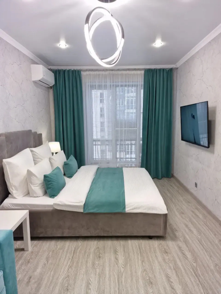 Квартира Flatirini с панорамными окнами в новом ЖК