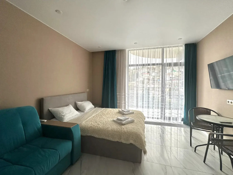 Апартаменты LS-Family Comfort с видом на горы и город с 4 этажа