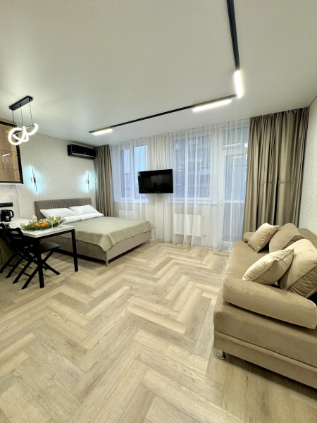 Квартира Стильная студия у площади Ленина