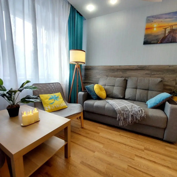 Апартаменты Квартира с качелями в центре