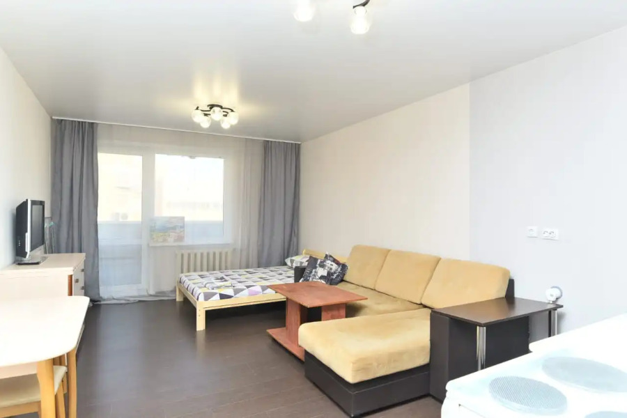 Апартаменты Уютная студия на Зорге 94