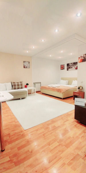 Апартаменты Тихая студия 33кв.м,джакузи,рядом станция подземного трамвая и ТЦ